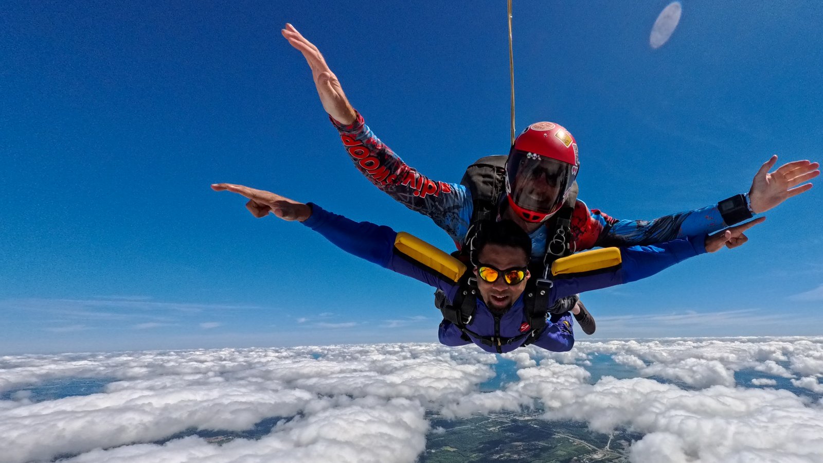 Experienced skydivers exiting the aircraft at Skydive SWOOP